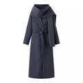 Women’s long coat with oversized shawl collar, belt at the waist and pinstripes Fashion Glam