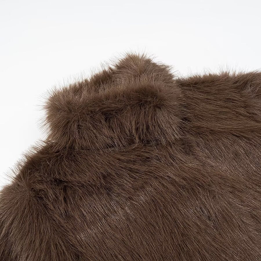 Ladies short jacket made of voluminous faux fur with high collar and boxy silhouette Fashion Glam
