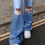 Ladies High-Waisted Flared Jeans in Retro Cut with Knee Rip and Extended Hem Fashion Glam