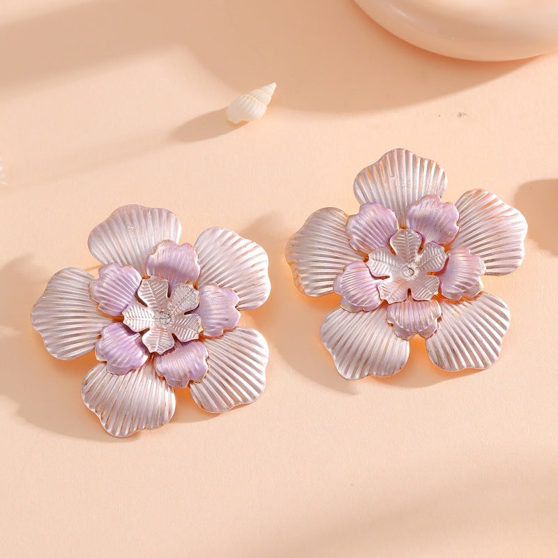 Ladies' flower earrings with intricate design and glossy accents Fashion Glam
