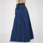 Women’s high-waisted A-line denim maxi skirt with decorative seams and raw fringe hem Fashion Glam