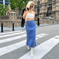 Women's waist-accentuating denim midi skirt with wave-shaped decorative seams and flared hem Fashion Glam