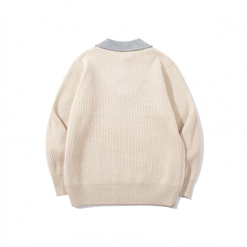 Unisex chunky knit boxy sweater with V-neck and contrasting polo button collar Fashion Glam