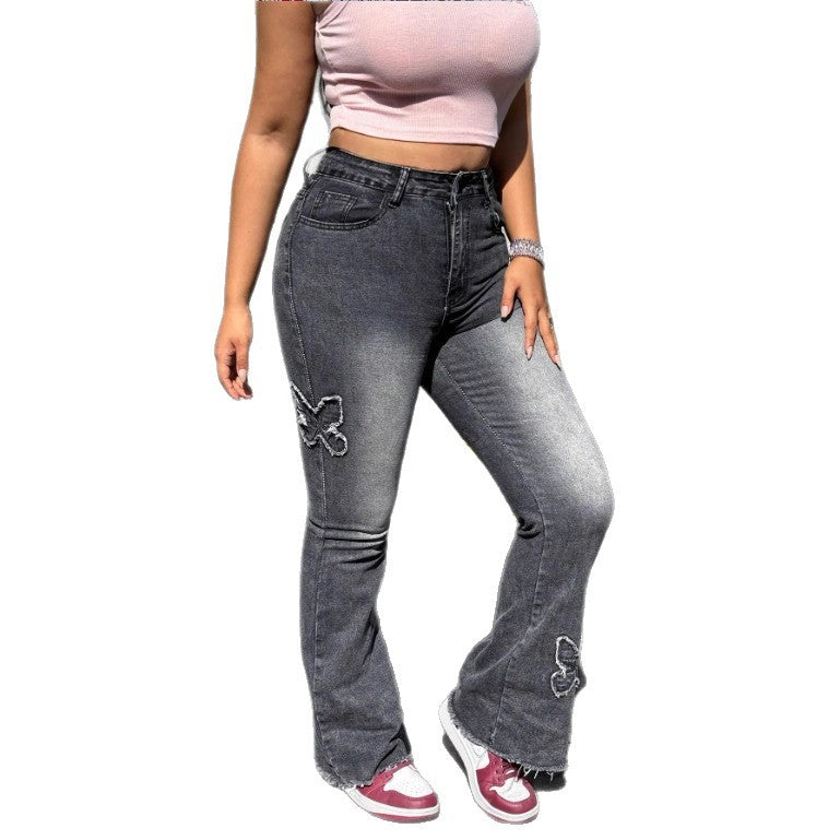 Ladies High-Waisted Flared Jeans with Butterfly Embroidery, Raw Hem and Sculpting Stretch Waistband Fashion Glam