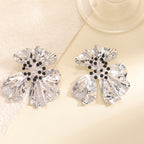 Women’s metal flower earrings with sparkling red accents Fashion Glam