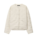 Women's short cut quilted jacket with round neckline and tonal bow quilting Fashion Glam