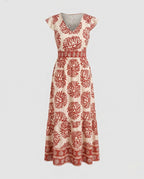 Women's maxi dress with floral pattern and split skirt