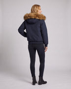 Women's short urban thermal parka with detachable faux fur trim, raglan sleeves, and concealed two-way zipper