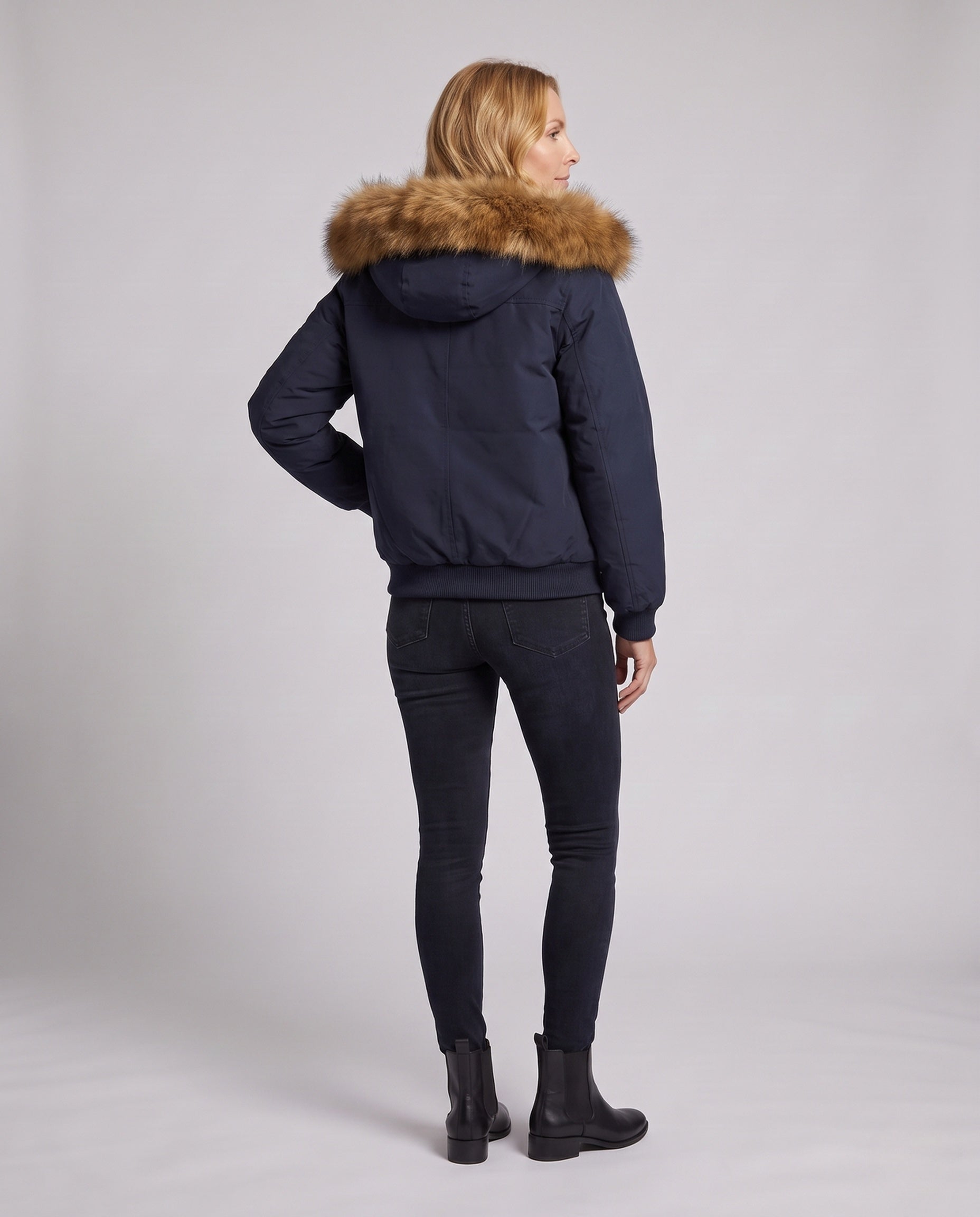 Women's short urban thermal parka with detachable faux fur trim, raglan sleeves, and concealed two-way zipper