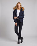 Women's short urban thermal parka with detachable faux fur trim, raglan sleeves, and concealed two-way zipper