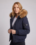 Women's short urban thermal parka with detachable faux fur trim, raglan sleeves, and concealed two-way zipper
