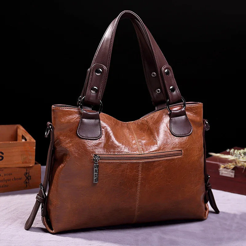Fashion Glam | Bags made of supple leather with two straps and elegant details