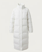 Women's longer quilted winter coat with hood, windproof outer material and padded side pockets
