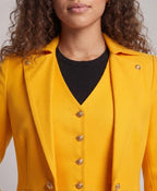 Women's elegant tailcoat with asymmetrical hem and golden accents Fashion Glam