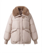 Women's modern oversized puffer with voluminous teddy collar, concealed two-way zipper and adjustable hem