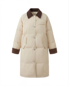 Women’s longer quilted thermal coat with contrasting cord collar, concealed snap button placket and oversized cut
