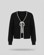 Women's short cardigan in boxy cut with crochet edge and decorative bow Fashion Glam