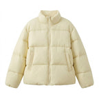 Women's short voluminous padded jacket with high shawl collar, two-way zipper, and concealed side pockets