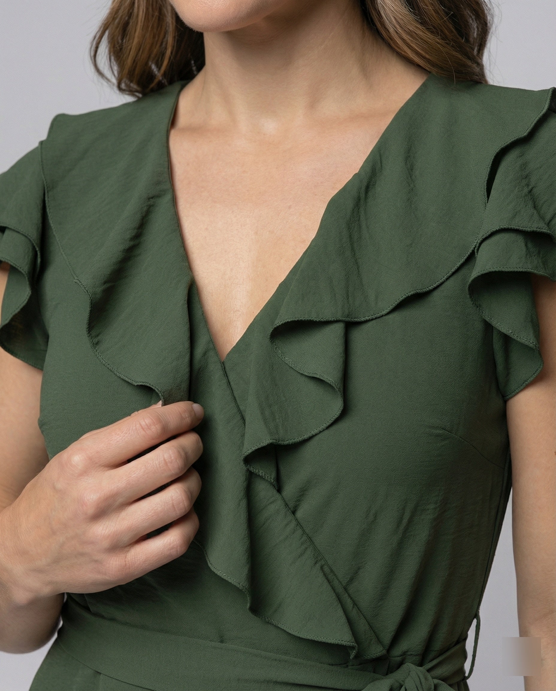 Women's wrap dress with voluminous ruffle details and waist belt