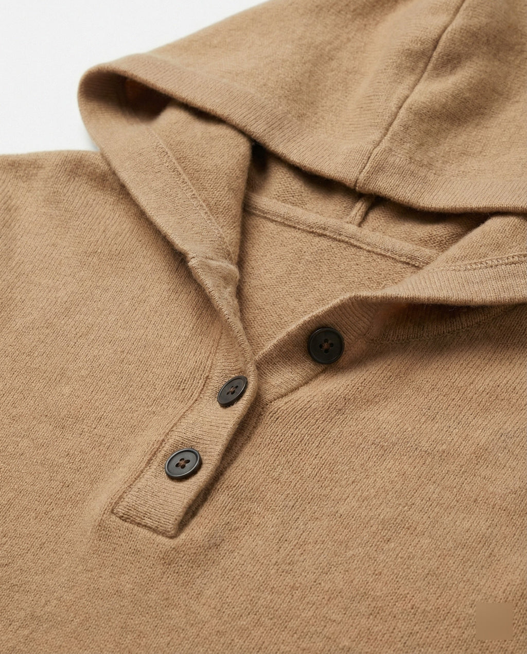 Women's hoodie dress made of soft knit material with button placket and hood