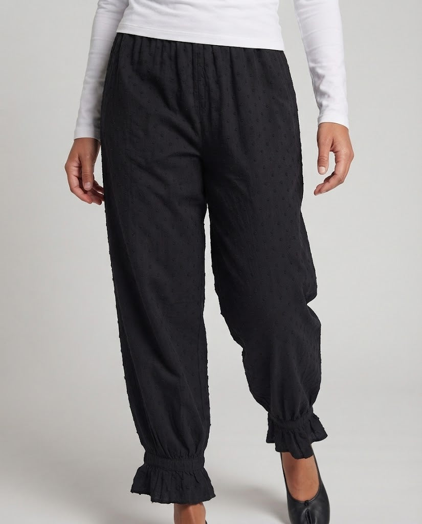 Women's wide linen-look trousers with elastic waistband and flounce cuffs Fashion Glam