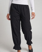 Women's wide linen-look trousers with elastic waistband and flounce cuffs Fashion Glam