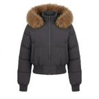 Ladies nano short padded hooded puffer with voluminous faux fur trim, ribbed cuffs, and warming thermal filling
