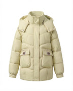 Women's mid-length padded parka with high stand-up collar flap, stowable hood, and large cargo pockets