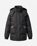 Women's mid-length padded parka with high stand-up collar flap, stowable hood, and large cargo pockets