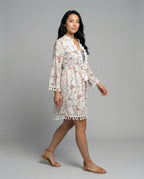 Women's beach dress with high collar and romantic floral pattern