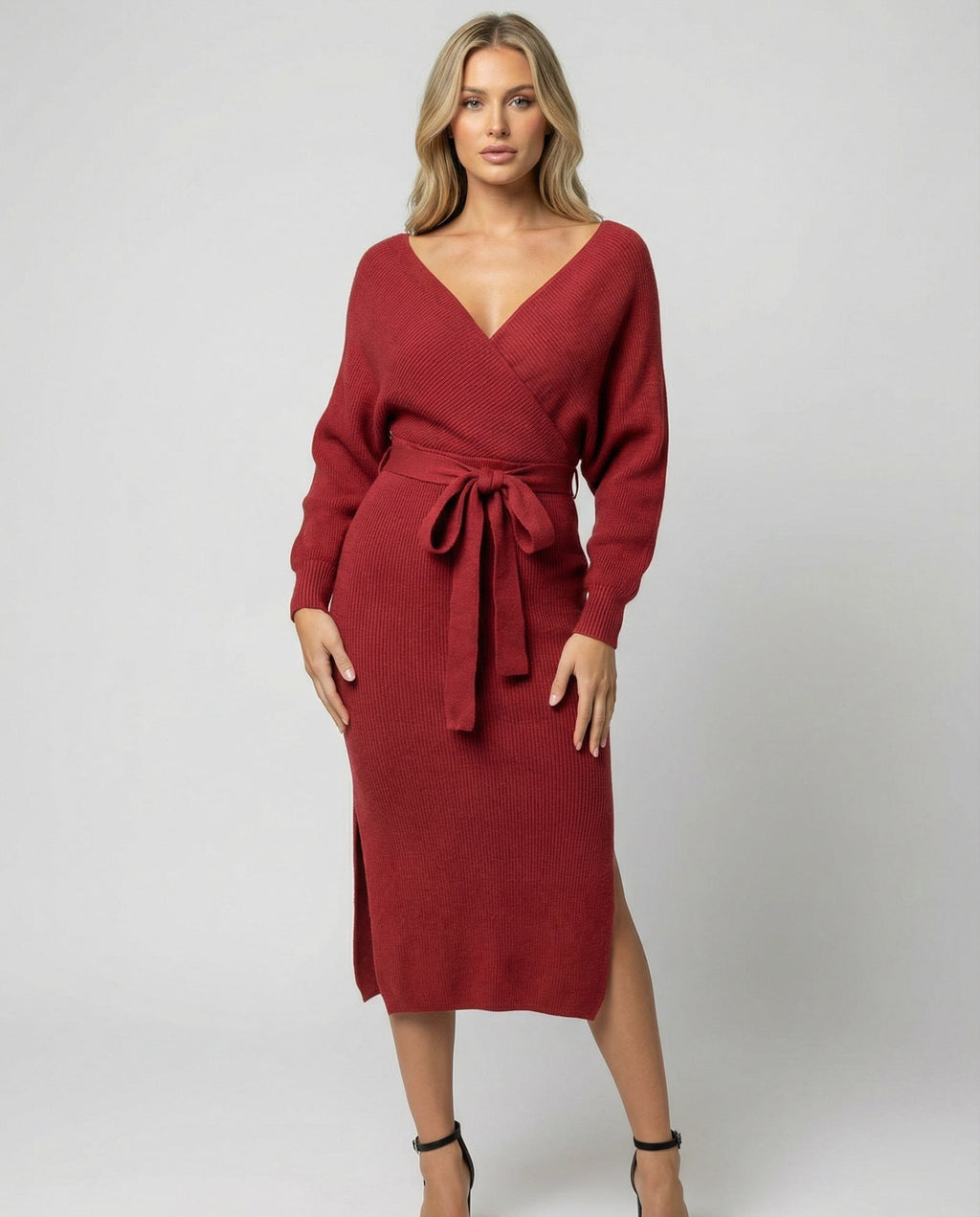 Women's knitted dress with elegant wrap design and decorative belt