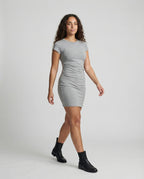 Figure-hugging mini dress with round neck and gathers for summer