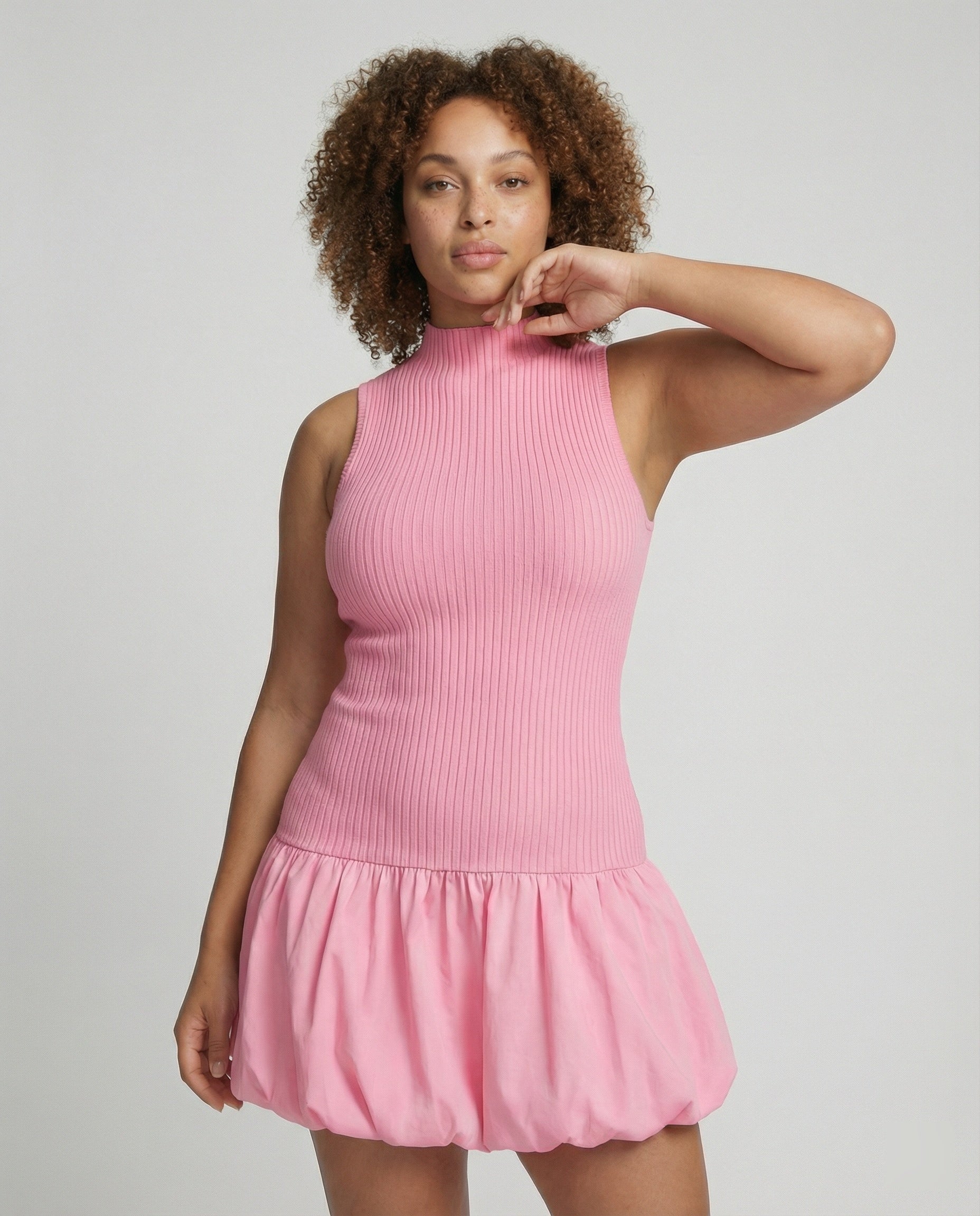 Women’s dress with sleeveless, figure-hugging top and voluminous skirt