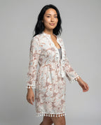 Women's beach dress with high collar and romantic floral pattern