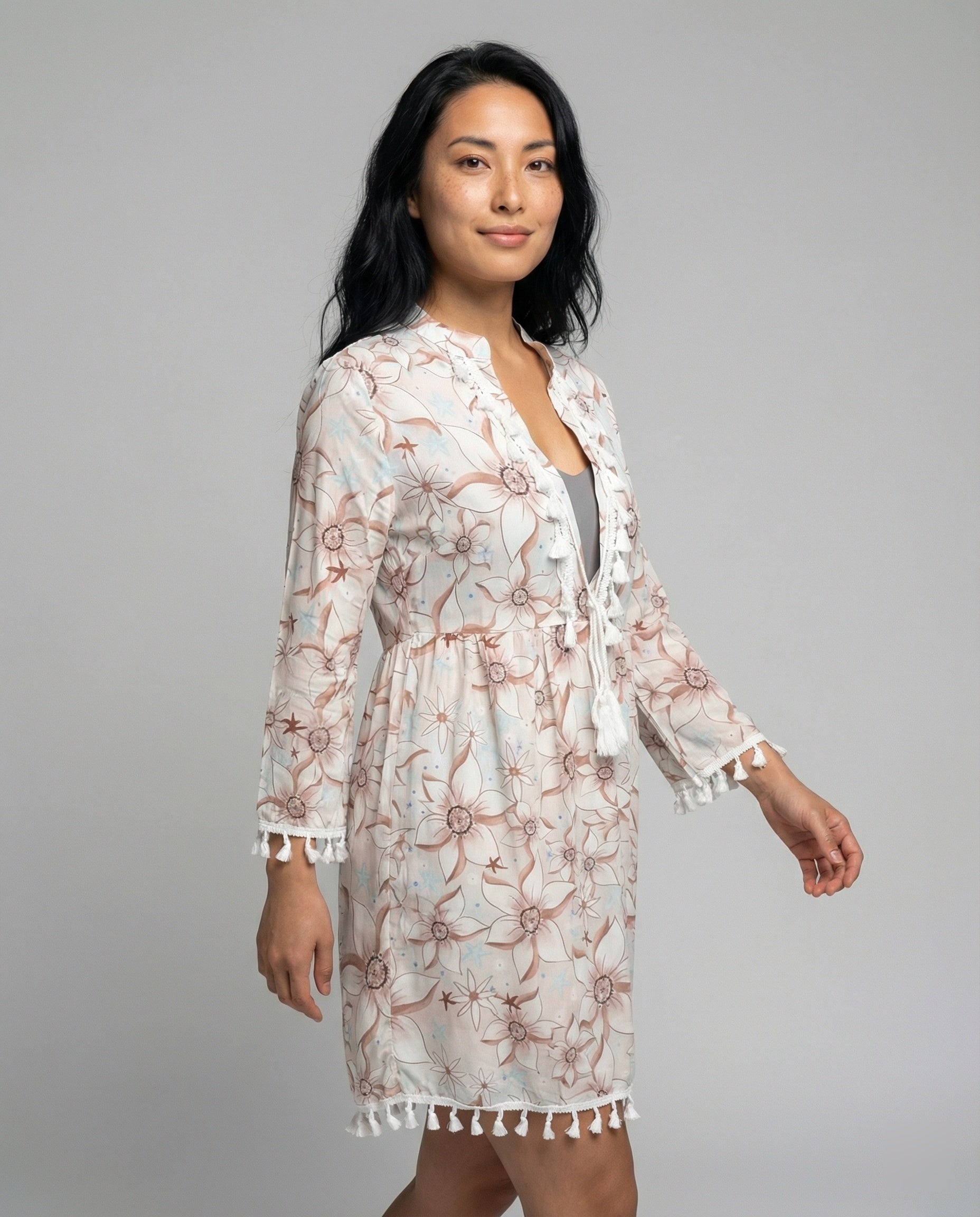Women's beach dress with high collar and romantic floral pattern