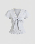 Women's casual blouse shirt with ruffle details and playful bow accent-Fashion Glam